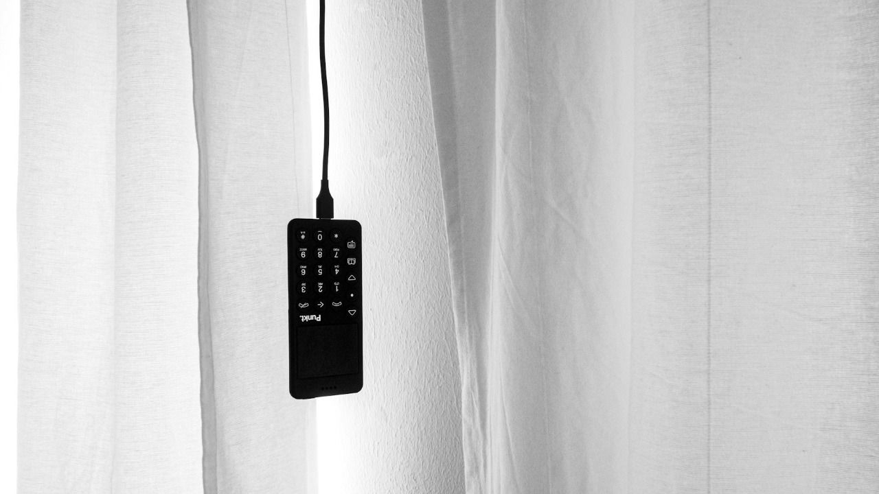 Punkt MP02 phone hanging upside down