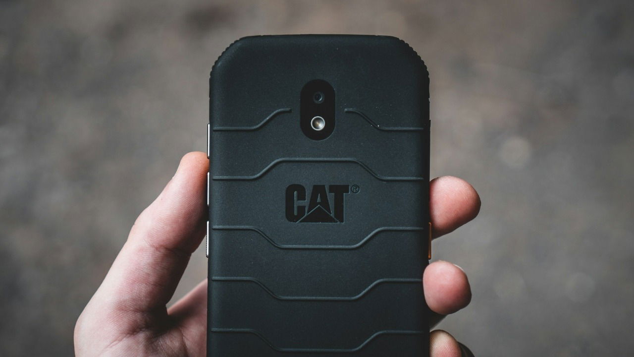 Person holding Cat S42 rugged smartphone