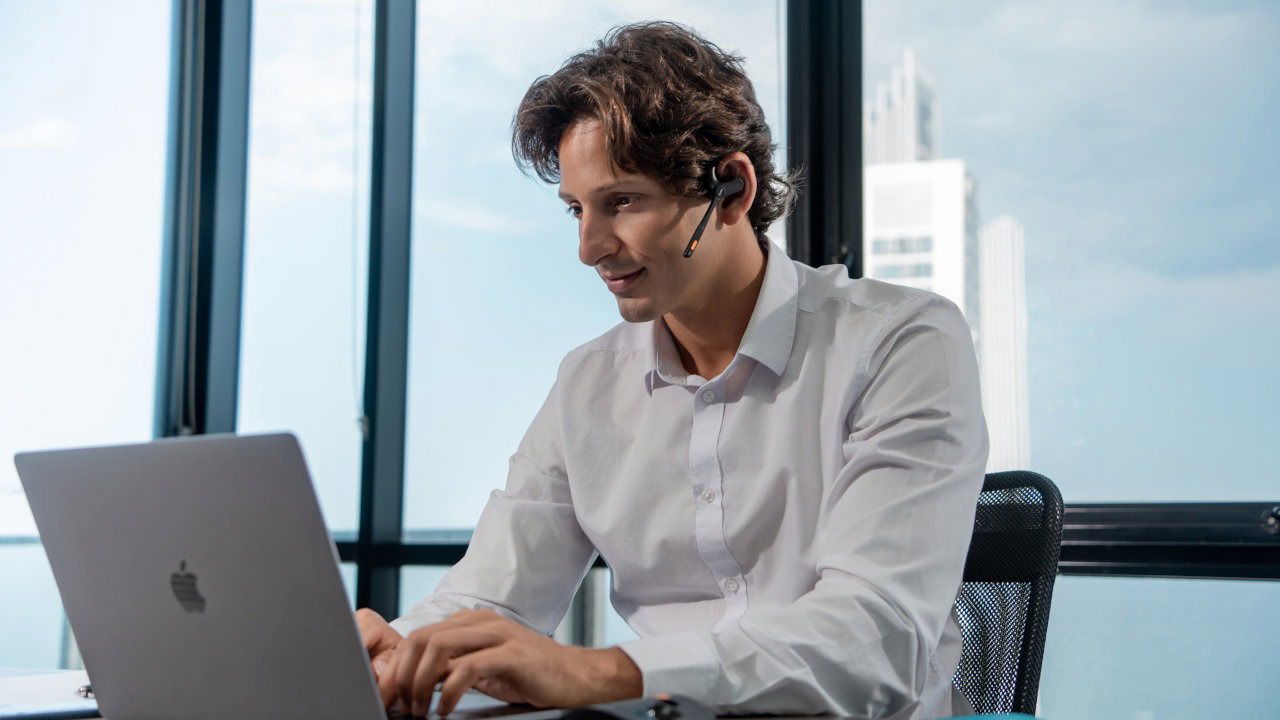 Man Using EKSA S30 Headset at Work