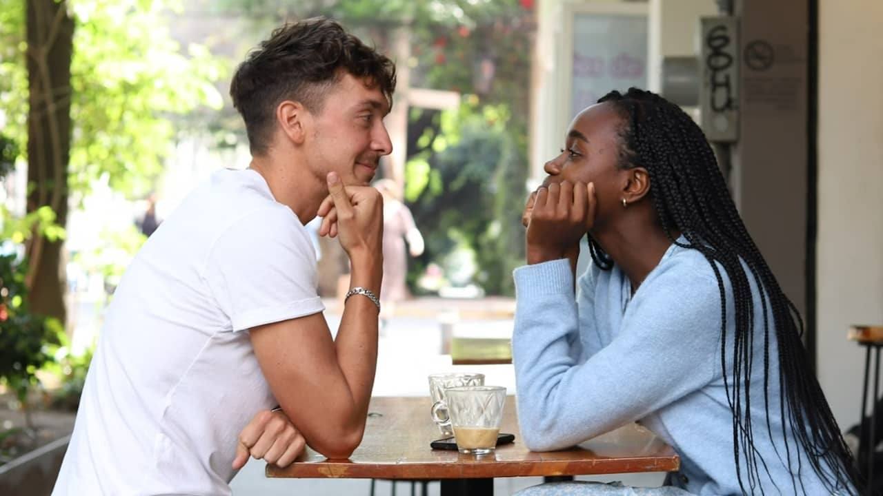 A couple looking deeply into each other's eyes.