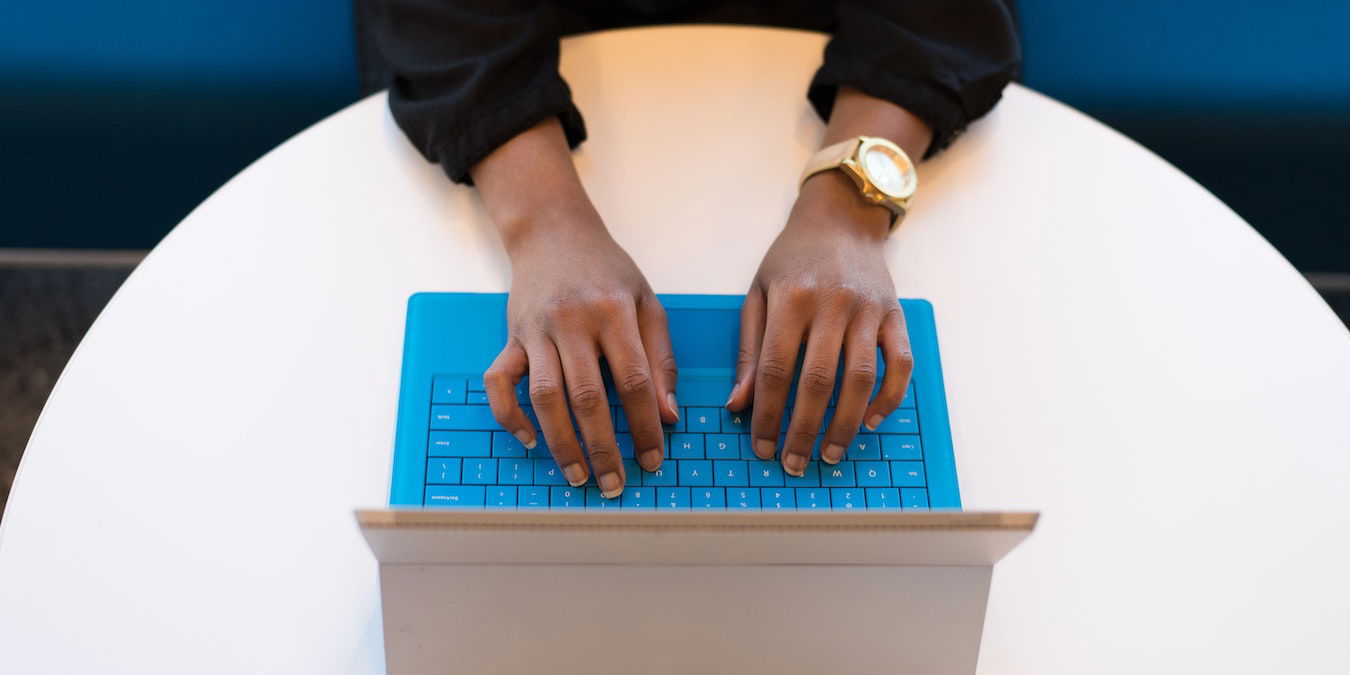 Man Using Microsoft Tablet For OneNote